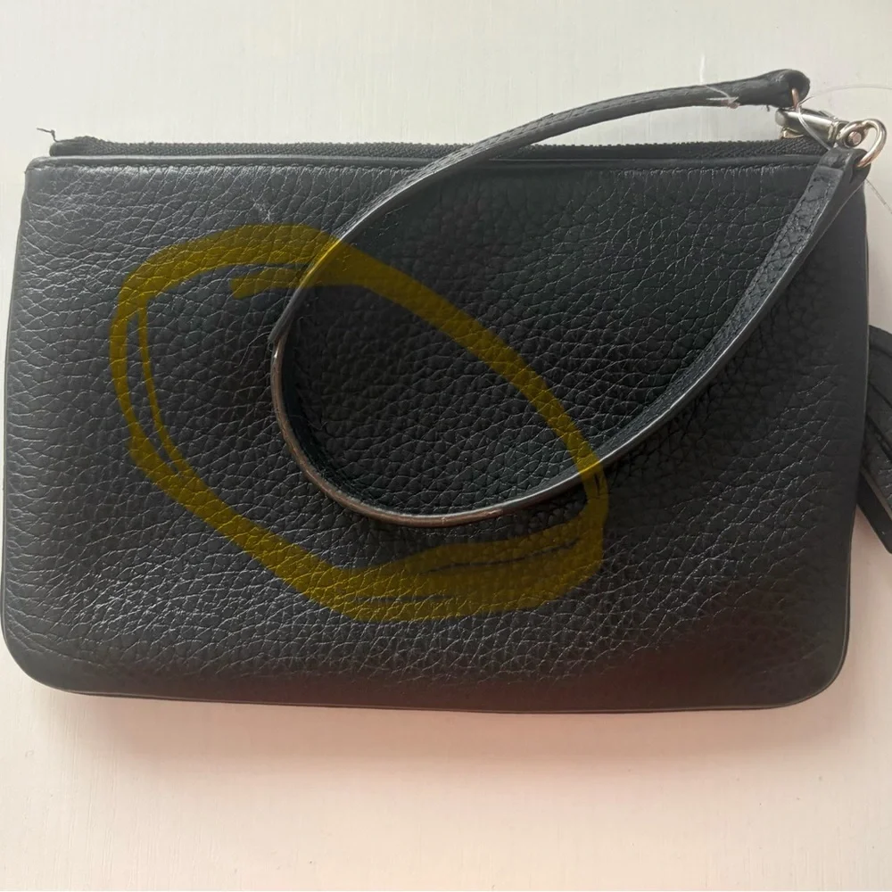 kate spade black pebbled leather wristlet with gold logo